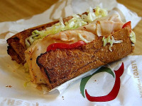 Quiznos Coupon: Free Drink/Chips With Purchase