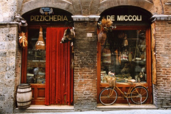 bicycle-parked-outside-historic-food-store-siena-tuscany-italy