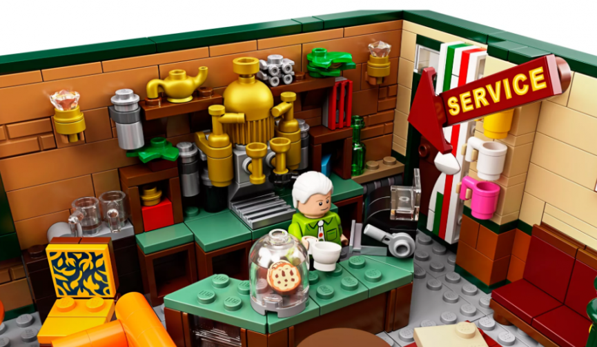 Inside of LEGO Central Perk with Gunther making coffee